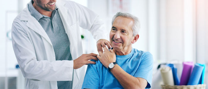 doctors hand on patient